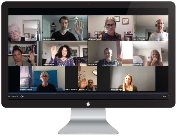 People in Zoom meeting on computer screen with raised hands