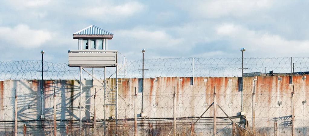 Correctional officer guard tower and outside prison wall