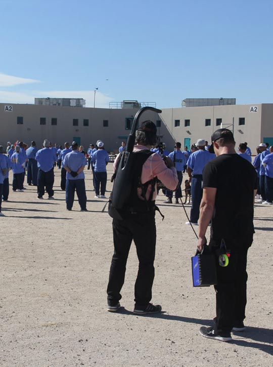 Two crew members filming Step Inside The Circle