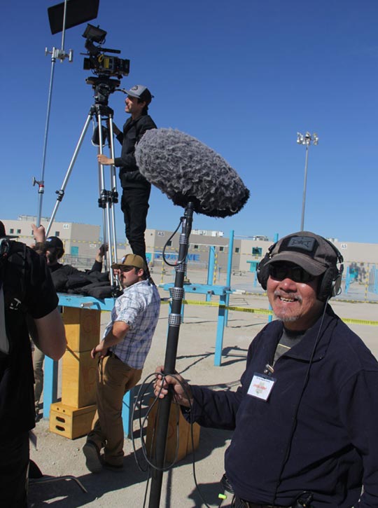 Boom operator smiling while on set of Step Inside The Circle documentary