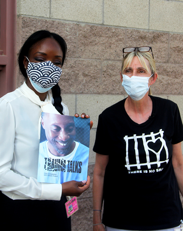 California Surgen General Nadine Burke Harris holding CPP's workbook, Trauma Talks